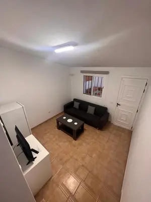 Zona de estar de Las Medinas Apartamentos