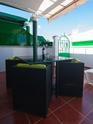 Un balcón o terraza de BUNGALOW CAMPO DE GOLF