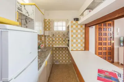 Una cocina o zona de cocina en GuestReady - Bello Horizonte 201