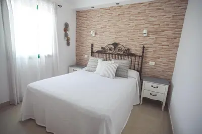 Cama o camas de una habitación en Ahtha Green Bungalow Maspalomas