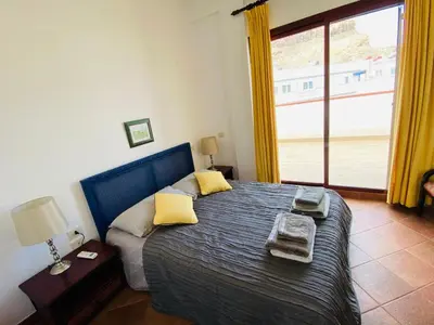 Cama o camas de una habitación en The Penthouse Puerto de Mogán