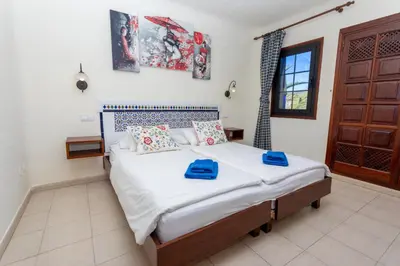 Cama o camas de una habitación en Altamar 52 with terrace & pool By CanariasGetaway