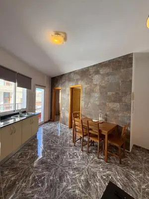 Zona de estar de Apartamentos La Aldea Suites