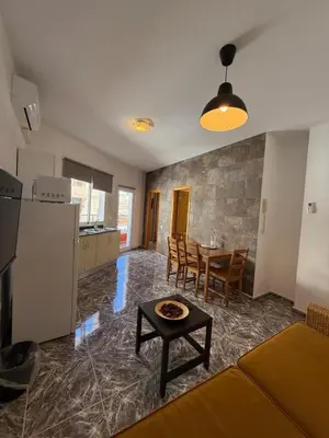 Una cocina o zona de cocina en Apartamentos La Aldea Suites