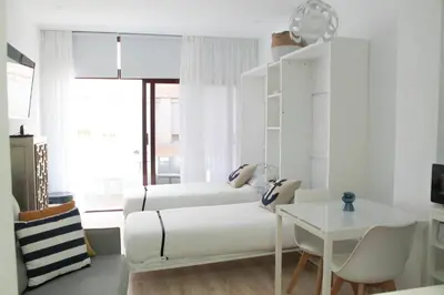 Cama o camas de una habitación en VV Loft Canteras Gran Playa 