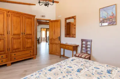 Cama o camas de una habitación en HOLIDAYS HOME TINAMAR II