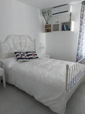 Cama o camas de una habitación en Vista Taurito