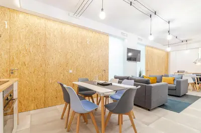 Zona de estar de Paez Suites