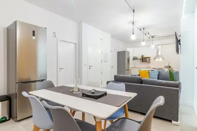 Una cocina o zona de cocina en Paez Suites