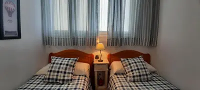 Cama o camas de una habitación en Isamaría Parque Santa Catalina