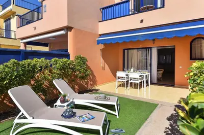 Un balcón o terraza de Duplex Bahia Meloneras 47 by VillaGranCanaria