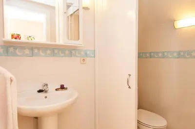 Un baño de Duplex Bahia Meloneras 47 by VillaGranCanaria