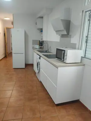 Una cocina o zona de cocina en Charming seaside apartment in Puerto de Mogán, 60 sqm
