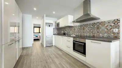 Una cocina o zona de cocina en Guanarteme Vista Surf, Las Canteras 1