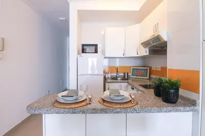 Una cocina o zona de cocina en Estudio frente a la playa de Las Canteras S64