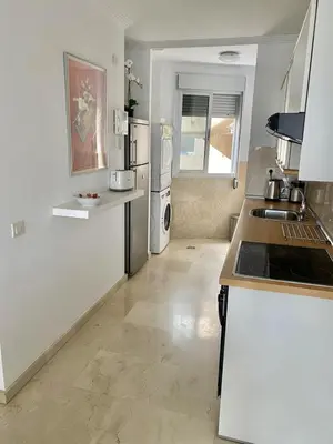 Una cocina o zona de cocina en HomeForGuest Apartment next to Las Canteras with FREE Parking