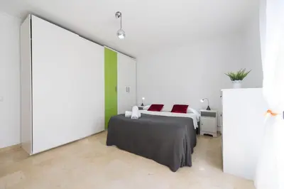 Cama o camas de una habitación en SG Carlos Family House