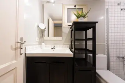 Un baño de SG Carlos Family House