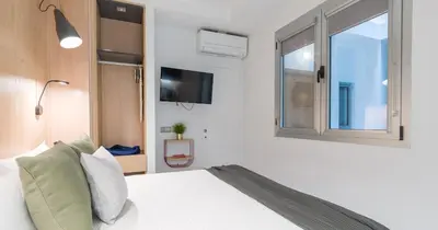 Cama o camas de una habitación en Tusity One