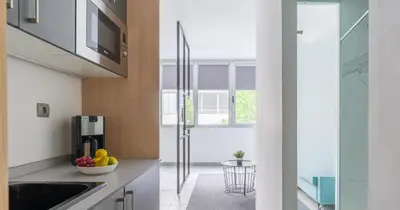 Una cocina o zona de cocina en Tusity One