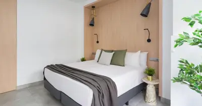 Cama o camas de una habitación en Tusity One