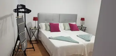 Cama o camas de una habitación en Apartamento cerca de la Playa de Las Canteras
