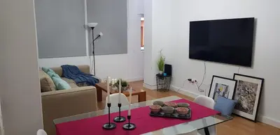 Una televisión o centro de entretenimiento en Apartamento cerca de la Playa de Las Canteras