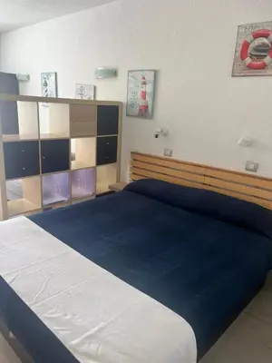 Cama o camas de una habitación en Tobago202