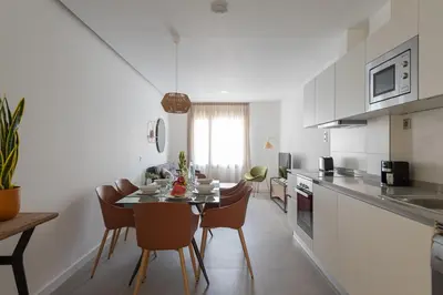 Una cocina o zona de cocina en Royal Flats-Viviendas Vacacionales