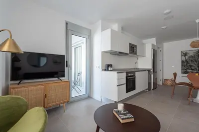 Una cocina o zona de cocina en Royal Flats-Viviendas Vacacionales