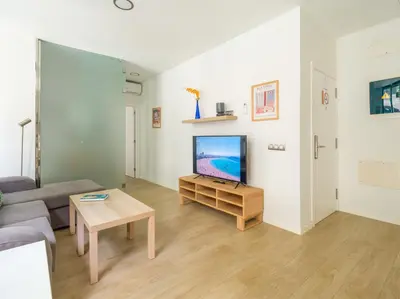 Una televisión o centro de entretenimiento en VIVENTE - Viviendas Vacacionales