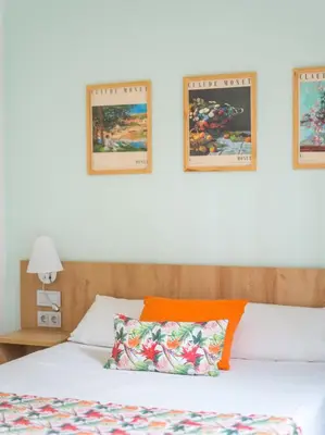 Cama o camas de una habitación en VIVENTE - Viviendas Vacacionales