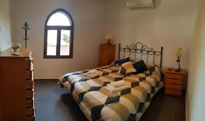 Cama o camas de una habitación en Casitas Gutiérrez