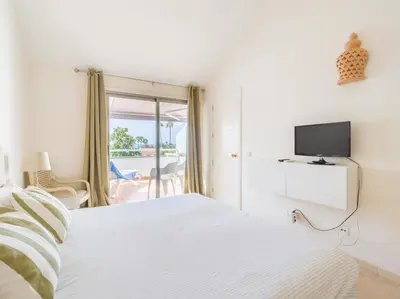 Cama o camas de una habitación en BLUE MARLIN APARTMENT - GRAN CANARIA STAYS