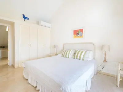 Cama o camas de una habitación en BLUE MARLIN APARTMENT - GRAN CANARIA STAYS