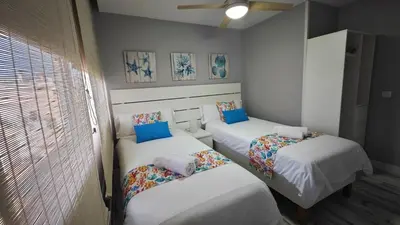 Cama o camas de una habitación en OHANA