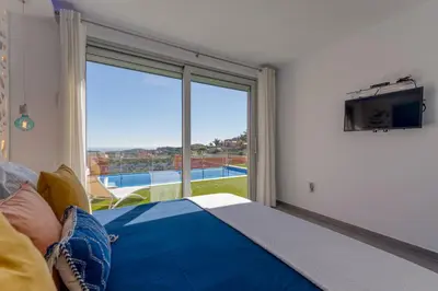 Una televisión o centro de entretenimiento en Casa ISLA