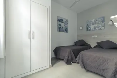 Cama o camas de una habitación en Puerto Mogan Apartment