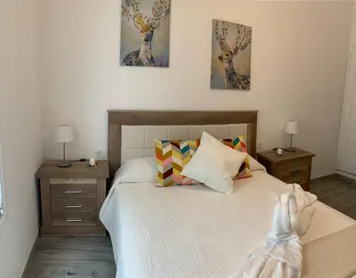 Cama o camas de una habitación en Alojamientos Agaete Pueblo N11