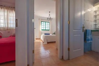 Cama o camas de una habitación en Dúplex con jardín y buenas vistas
