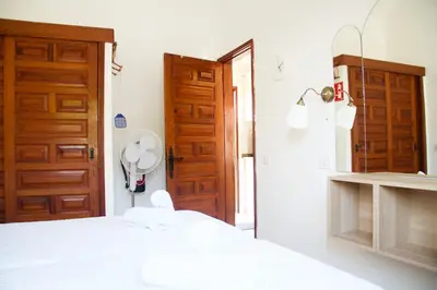 Cama o camas de una habitación en Casita blanca near yumbo