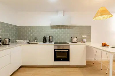 Una cocina o zona de cocina en Apartamentos Deluxe Strada