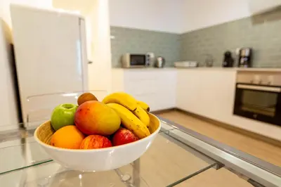 Una cocina o zona de cocina en Apartamentos Deluxe Strada
