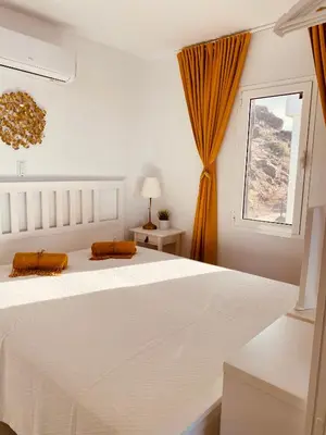Cama o camas de una habitación en Exclusive Bungalow with Stunning Sea Views by 75Steps