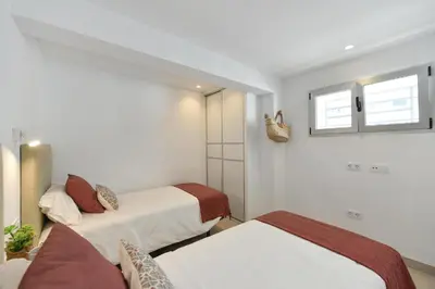 Cama o camas de una habitación en Nasas 12 by VillaGranCanaria