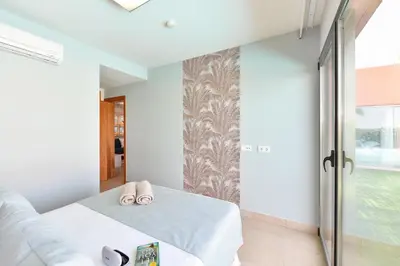 Cama o camas de una habitación en Albatross by VillaGranCanaria
