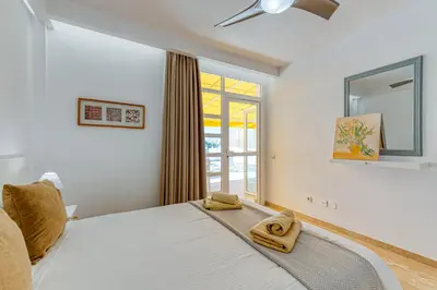 Cama o camas de una habitación en BLUE SEA I