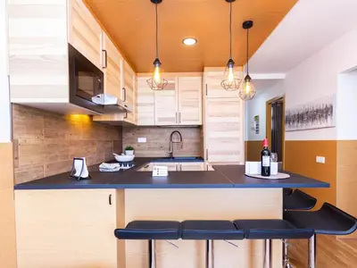 Una cocina o zona de cocina en Slipper friendly Holiday Home