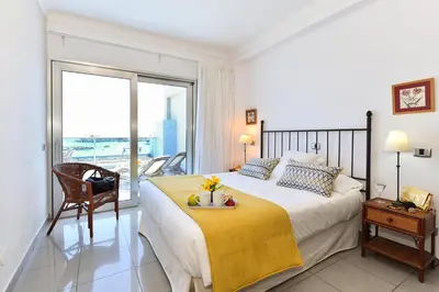 Cama o camas de una habitación en Luxury BeachFront Mogan
