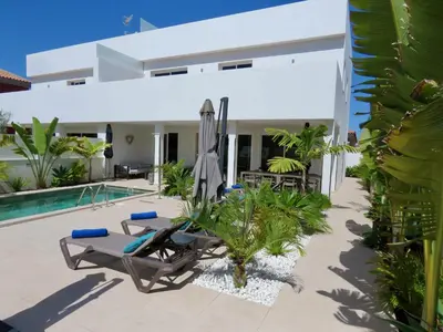 Piscina en o cerca de Villa Palm Breeze
